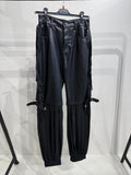 Pantalone in ecopelle con frange