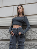 Maglione grigio con scollo a barchetta