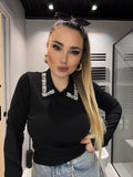 Maglioncino nero con strass e perle