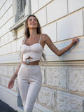 Completo top e pantalone con strass burro
