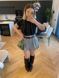 Maglioncino crop nero a trecce con strass