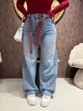 Jeans con cintura a cravatta