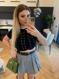 Maglioncino crop nero a trecce con strass