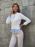 Maglione panna con trecce