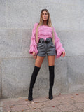 Maglione rosa barbie con frange