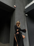 Set top e pantaloni con spacchi nero