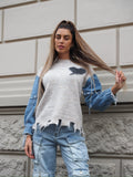 Maglione over con dettaglio in jeans