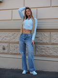 Jeans vita bassa con strappi laterali