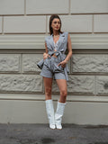 Completo smanicato e short grigio