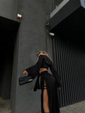 Set top e pantaloni con spacchi nero