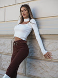 Pantalone choco con cintura oro