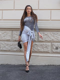Abito con paillettes e fiocco silver