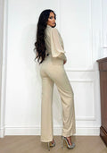 Tuta beige con cintura