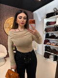 Maglia a maniche lunghe con scollo drappeggiato