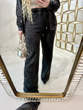 Completo con felpa over e brillantini pantalone a zampa