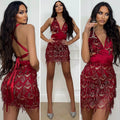 Abito con frange e paillettes rosso scollo a V