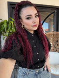 Camicia con fiori ricamati