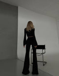 Due pezzi top e pantalone nero