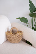 Borsa in raffia con dettaglio oro