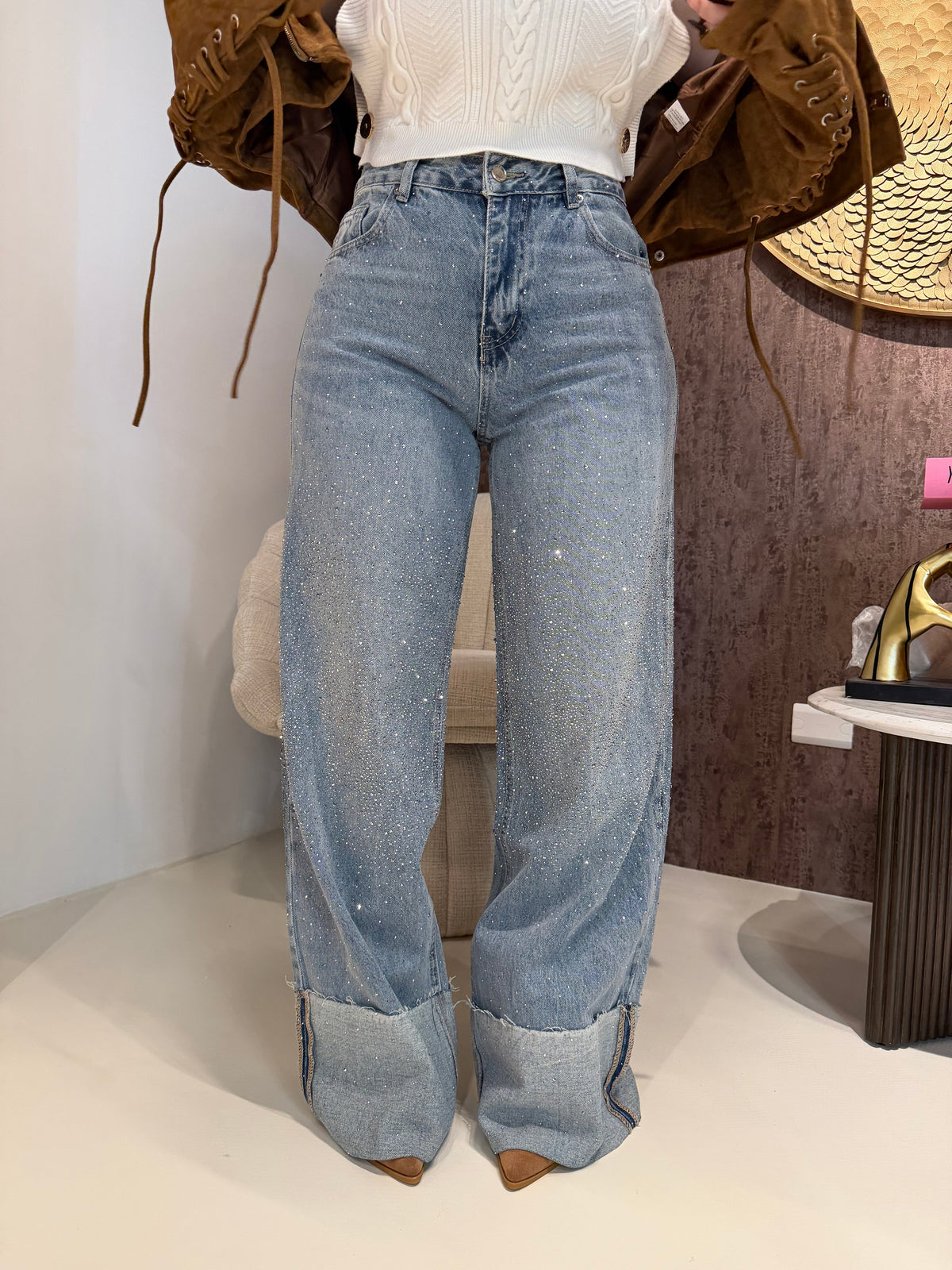 Jeans con risvolto e strass