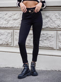 Pantalone nero con cintura oro