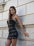 Abito con frange e paillettes nero
