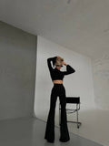Due pezzi top e pantalone nero