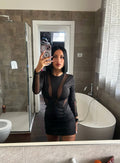 Abito nero con trasparenze