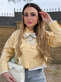 Camicia gialla con dettaglio bianco