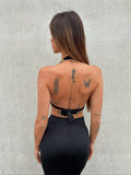 Completo top e gonna nero con gioiello