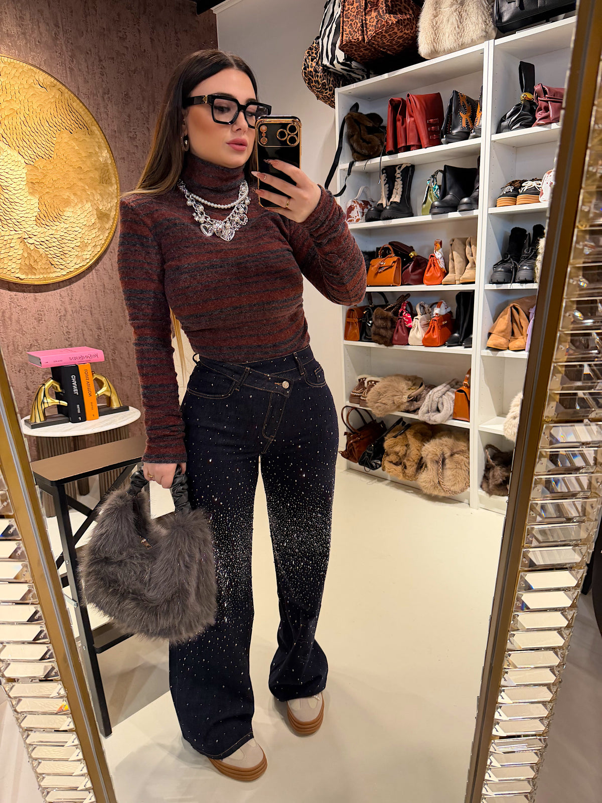 Maglioncino collo alto a righe spalle bombate
