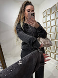 Completo con felpa over e brillantini pantalone a zampa