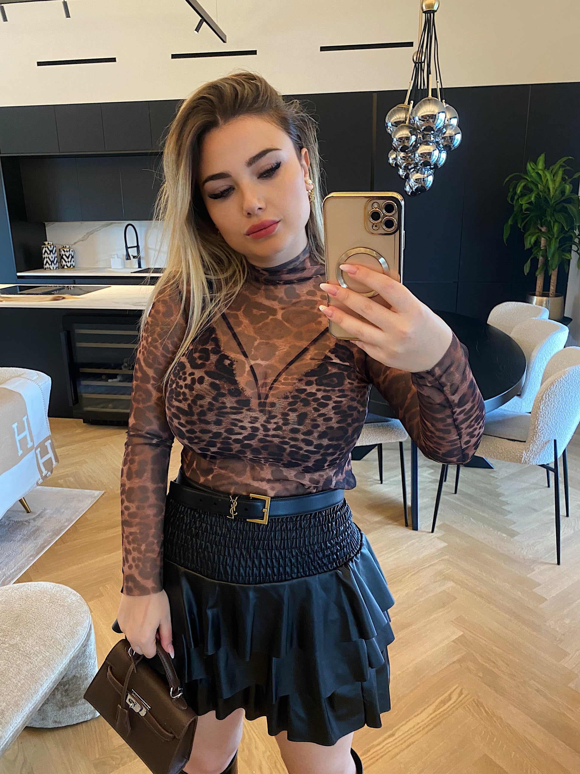 Blusa in velo animalier
