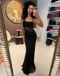 Abito lungo con spacco e strass