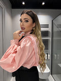 Camicia rosa con fiocco