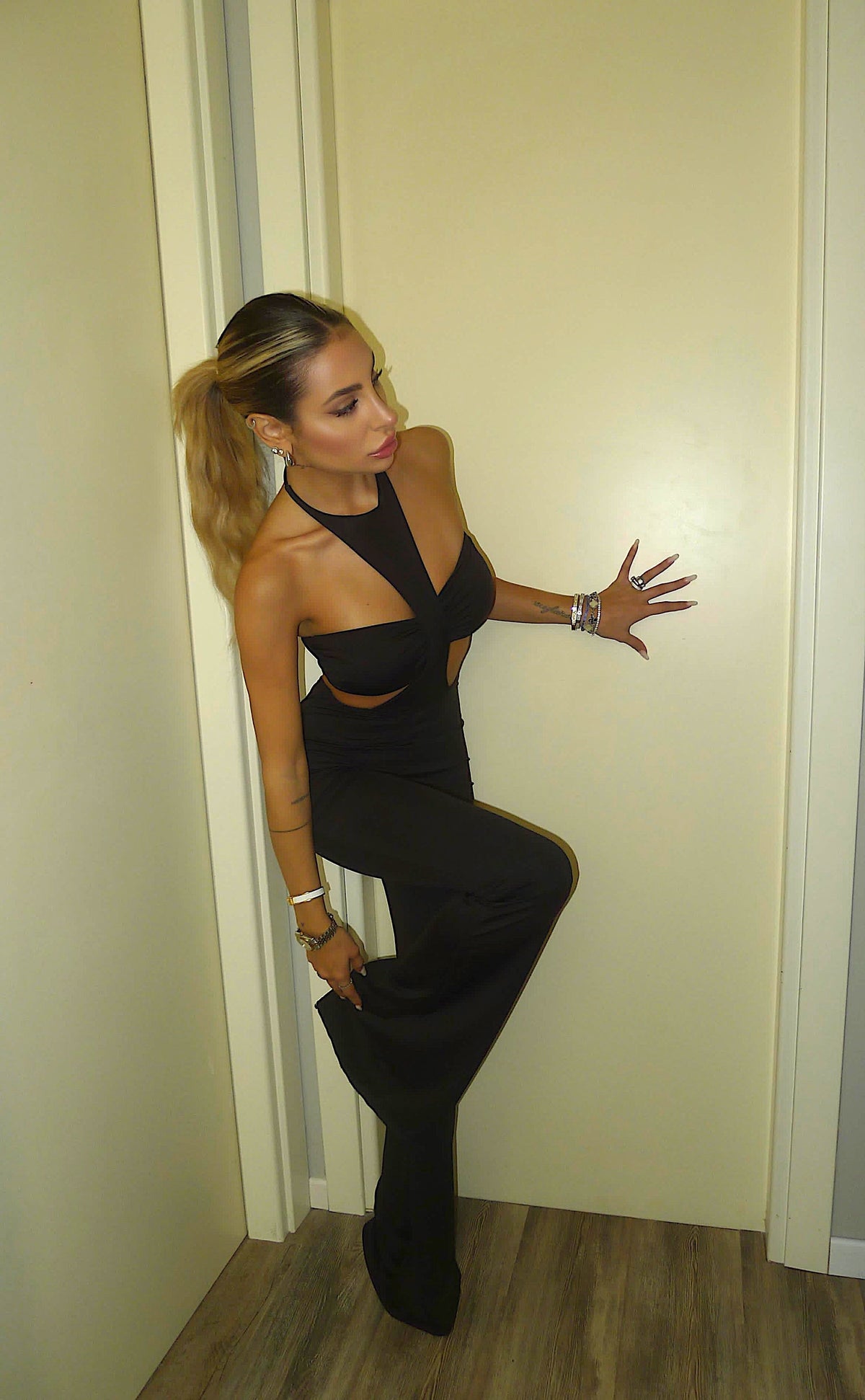 Tuta nera con fascia