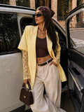 Blazer oversize con maniche in pizzo