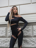 Maglia nera con spacchi