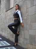 Completo smanicato e pantalone ecopelle