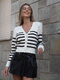 Maglione a righe spalline in strass