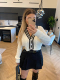 Maglione/ cardigan bianco nero con bottoni