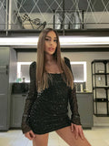 Abito nero con paillettes schiena aperta