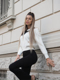 Maglione panna con fiocco nero