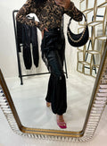 Pantalone in ecopelle con frange