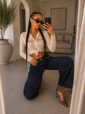 Jeans wide leg con dettagli maculati