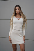Abito in maglia beige con nodo in strass
