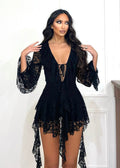 Abito in pizzo nero con rouches