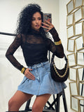 Maglia in pizzo collo alto