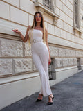 Tuta monospalla beige con cintura