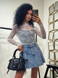 Maglia in pizzo collo alto